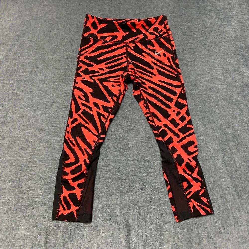 Nike Dri Fit Power Epic Lux Capri Leggings Womens XS Black Orange Abstract Print